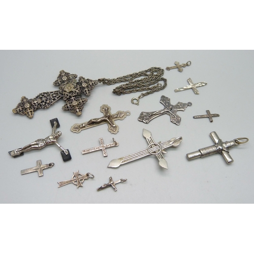 995 - A collection of thirteen cross pendants