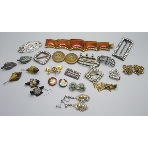 998 - A collection of vintage jewellery and buckles, including a gold mining brooch, one panel of large br... 