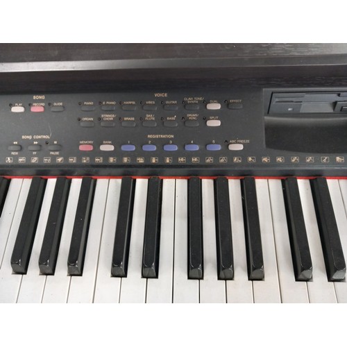 2362 - A Yamaha Clavinova CVP-59S 88 key digital piano with stool and a quantity of sheet music