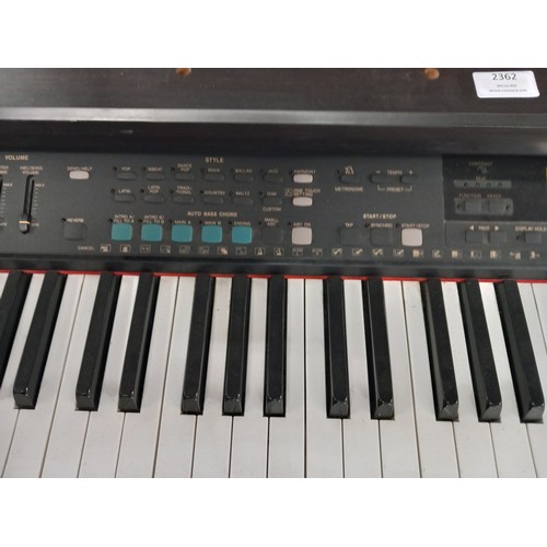 2362 - A Yamaha Clavinova CVP-59S 88 key digital piano with stool and a quantity of sheet music