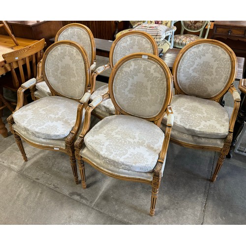 333 - A set of five French Louis XV style walnut and fabric upholstered fauteuil chairs