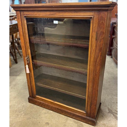 314 - A Victorian walnut single door pier cabinet