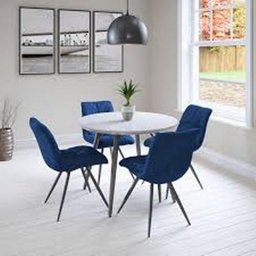 1337 - A Logan circular dining table and four blue Arana chairs