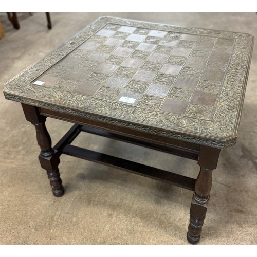 A faux bronze topped games table