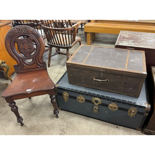 357 - A Victorian carved mahogany hall chair and two steamer trunks