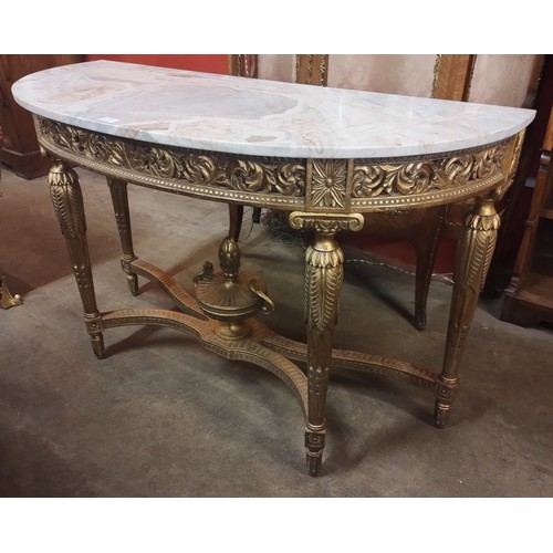 132 - A French Louis XIV style giltwood and marble topped console table