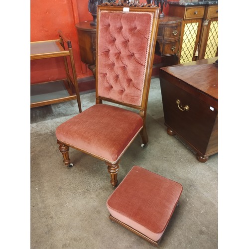 137 - A Victorian carved mahogany and fabric upholstered lady's chair and footstool