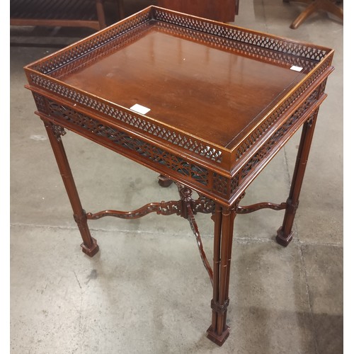 139 - A Chippendale Revival mahogany fretwork silver table