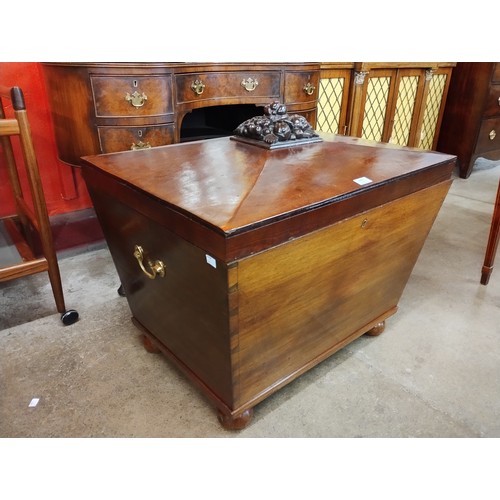 143 - A George IV mahogany sarcophagus shaped wine cooler