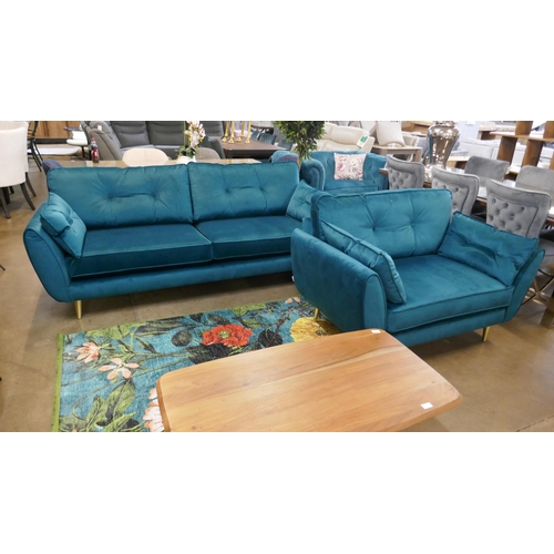 1301 - A teal velvet upholstered button back three seater sofa and armchair on brass effect legs