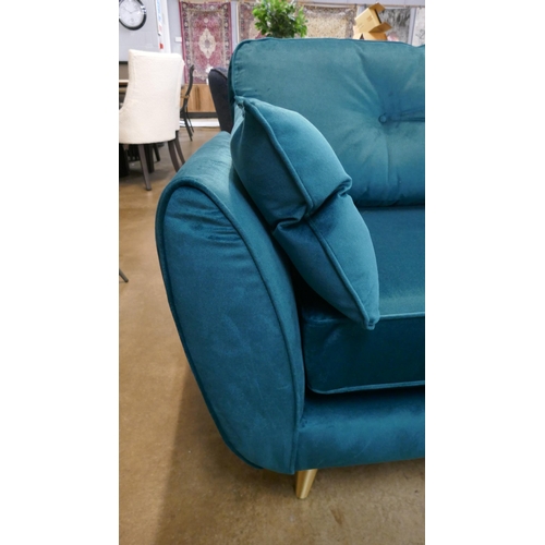 1301 - A teal velvet upholstered button back three seater sofa and armchair on brass effect legs