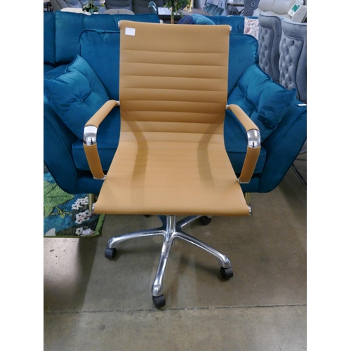 1323 - A tan Eames style office chair