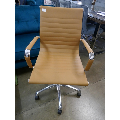 1324 - A tan Eames style office chair