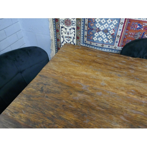 1327 - A Haryana dining table, bench and four black velvet chairs   *This lot is subject to VAT