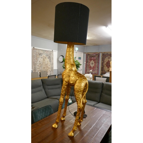 1392 - A large floor standing lamp in the form of a giraffe