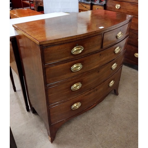 145 - A George III mahogany bow front chest of drawers