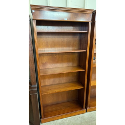 369 - A carved mahogany open bookcase