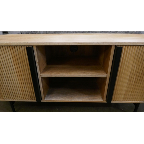 1438 - A light hardwood ribbed TV unit  *This lot is subject to VAT