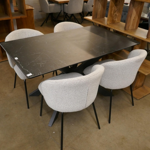 1447 - A black ceramic dining table and four grey boucle chairs, chipped top  *This lot is subject to VAT