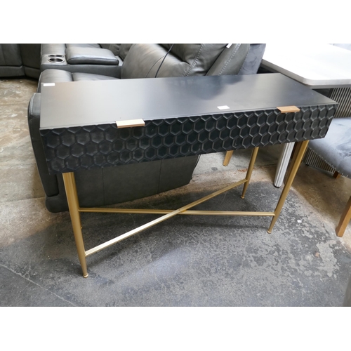 1478 - A black console table with gold legs