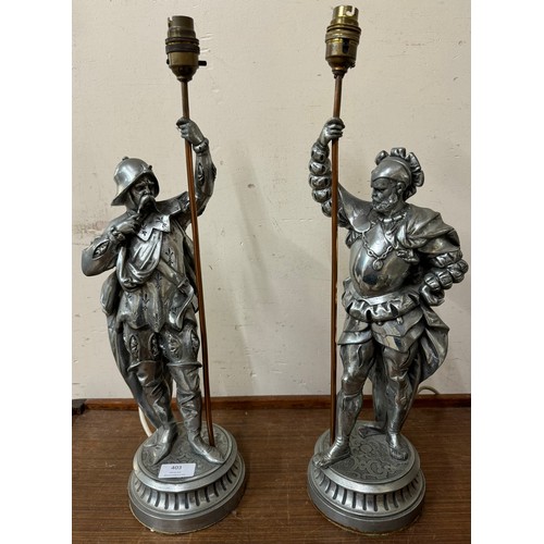 403 - A pair of spelter figural knight table lamps