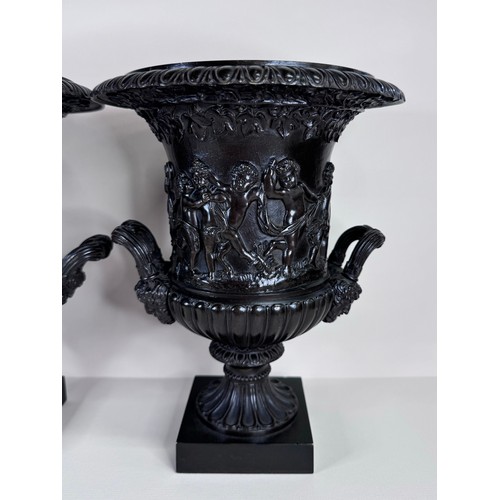 99 - A pair of 19th Century Italian Grand Tour bronze Medici vases, 27cms h