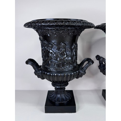 99 - A pair of 19th Century Italian Grand Tour bronze Medici vases, 27cms h