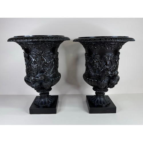 99 - A pair of 19th Century Italian Grand Tour bronze Medici vases, 27cms h