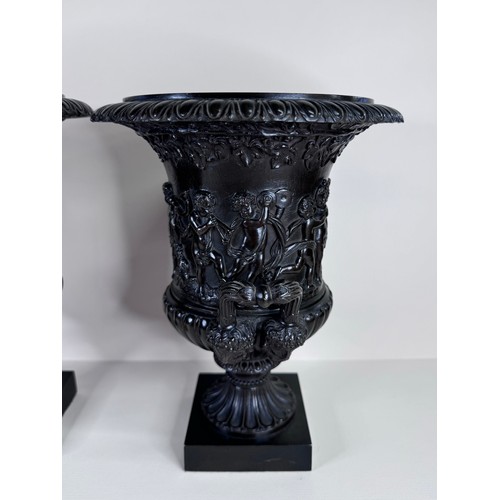 99 - A pair of 19th Century Italian Grand Tour bronze Medici vases, 27cms h