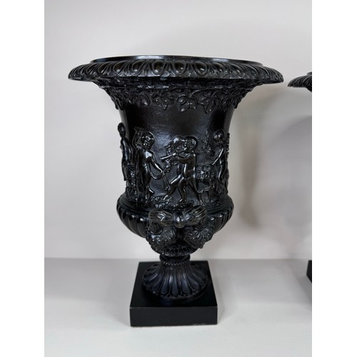 99 - A pair of 19th Century Italian Grand Tour bronze Medici vases, 27cms h