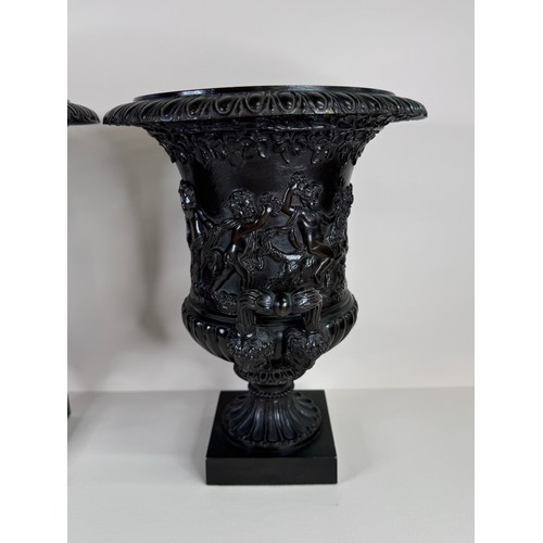 99 - A pair of 19th Century Italian Grand Tour bronze Medici vases, 27cms h