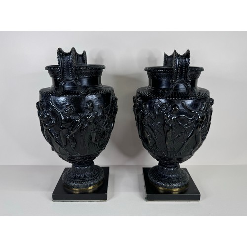 100 - A pair of 19th Century bronze Townley vases, 24cms h