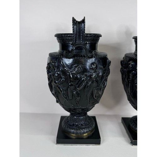 100 - A pair of 19th Century bronze Townley vases, 24cms h