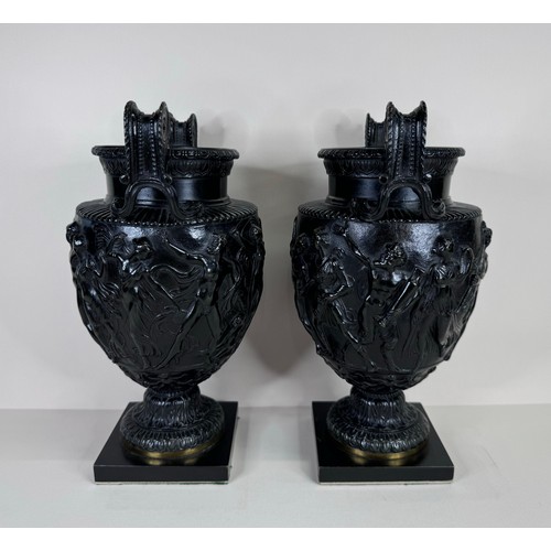 100 - A pair of 19th Century bronze Townley vases, 24cms h