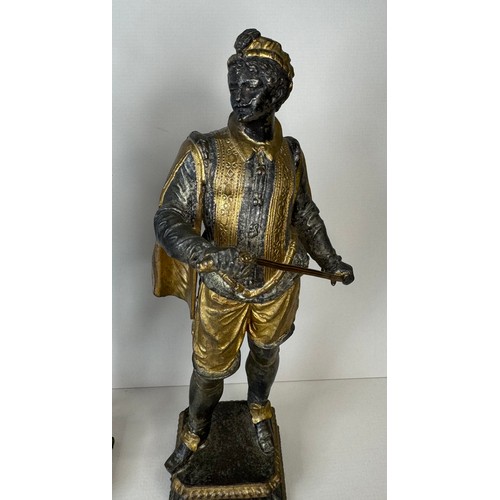 106 - A set of three 19th Century French gilt spelter figures of cavaliers and a musician, tallest; 25cms ... 