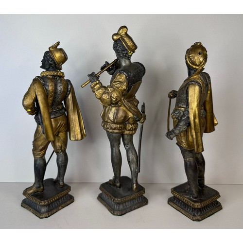 106 - A set of three 19th Century French gilt spelter figures of cavaliers and a musician, tallest; 25cms ... 