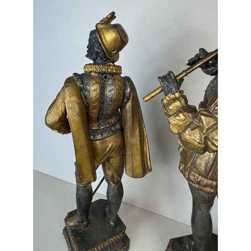 106 - A set of three 19th Century French gilt spelter figures of cavaliers and a musician, tallest; 25cms ... 