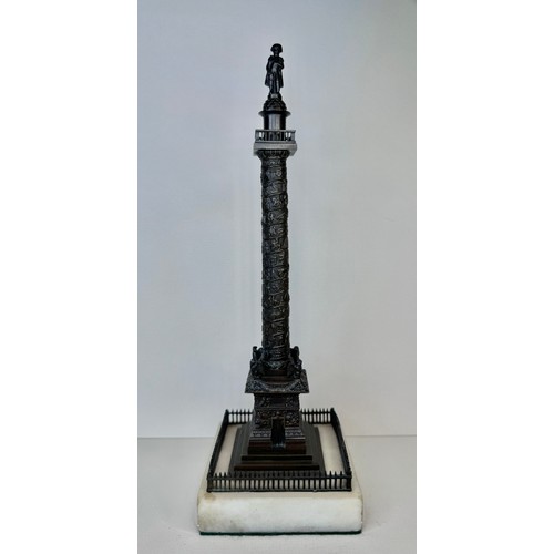 107 - A 19th Century French bronze Vendome Column, on marble socle, 28cms h