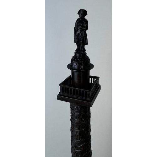 107 - A 19th Century French bronze Vendome Column, on marble socle, 28cms h