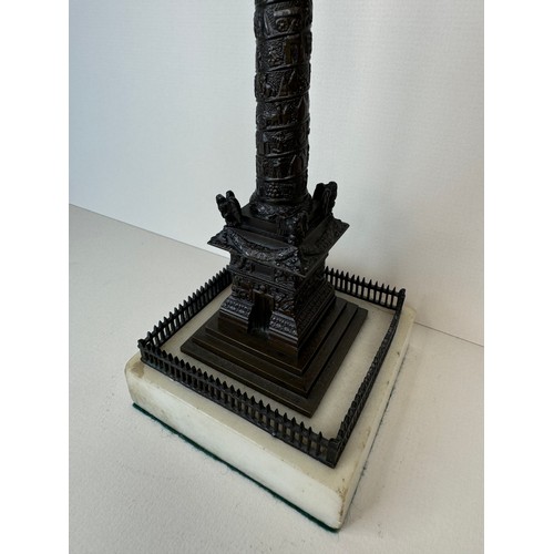 107 - A 19th Century French bronze Vendome Column, on marble socle, 28cms h