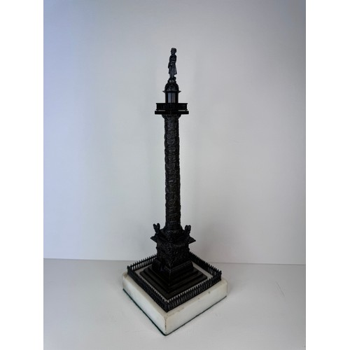 107 - A 19th Century French bronze Vendome Column, on marble socle, 28cms h