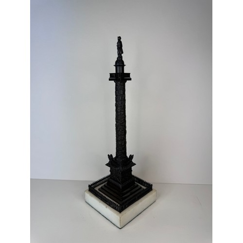 107 - A 19th Century French bronze Vendome Column, on marble socle, 28cms h