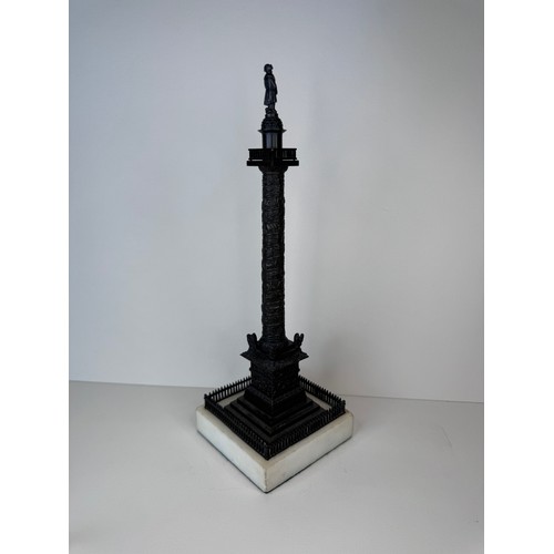 107 - A 19th Century French bronze Vendome Column, on marble socle, 28cms h