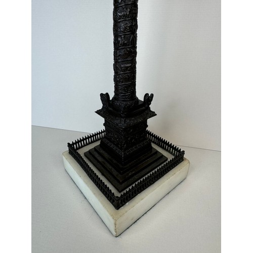 107 - A 19th Century French bronze Vendome Column, on marble socle, 28cms h