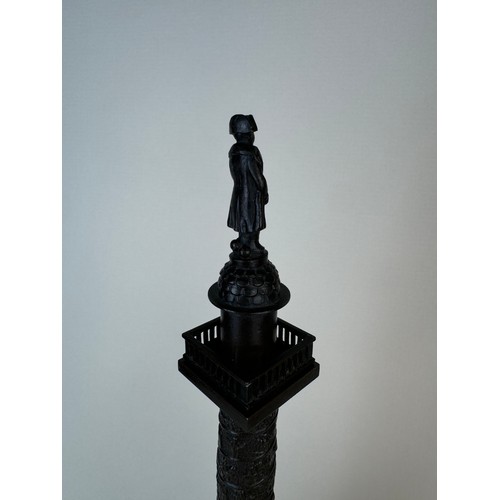 107 - A 19th Century French bronze Vendome Column, on marble socle, 28cms h