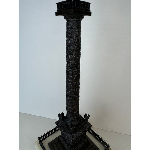 107 - A 19th Century French bronze Vendome Column, on marble socle, 28cms h