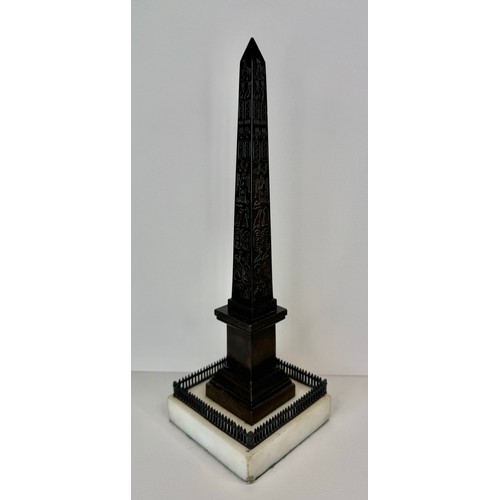 108 - A 19th Century French bronze Luxor Obelisk, on marble socle, 27cms h