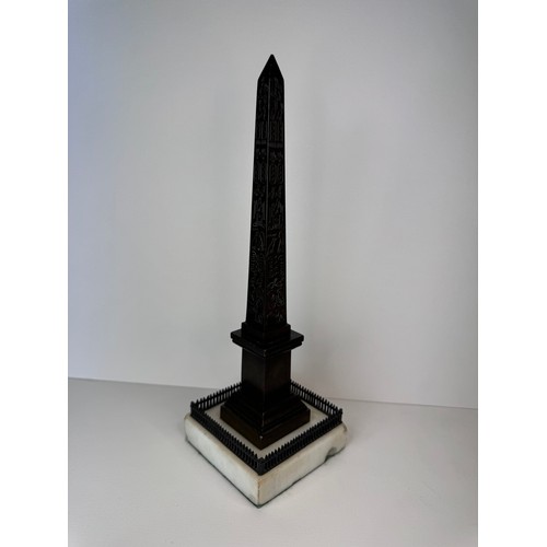 108 - A 19th Century French bronze Luxor Obelisk, on marble socle, 27cms h