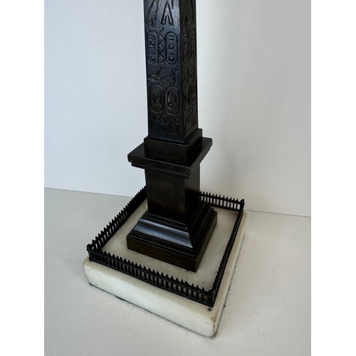 108 - A 19th Century French bronze Luxor Obelisk, on marble socle, 27cms h