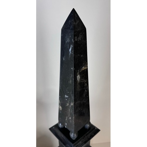 110 - A pair of 19th Century French white and black marble obelisks on stands, 49cms h